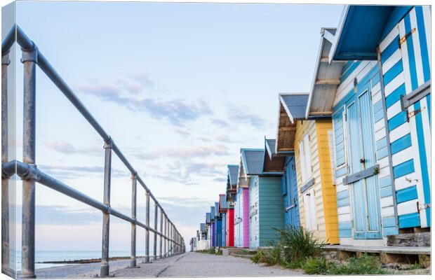 Looking up at the Cromer beach huts Canvas Print by Jason Wells