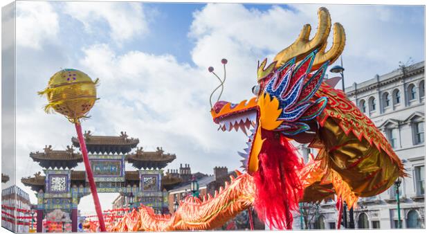 Dragon chasing the pearl Canvas Print by Jason Wells