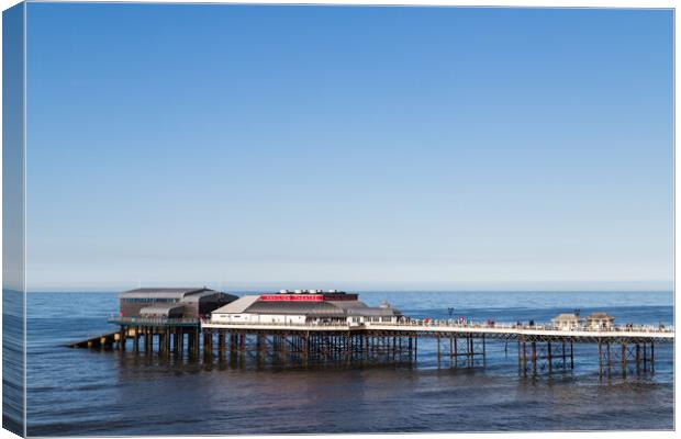 Cromer pier under a blue sky Canvas Print by Jason Wells