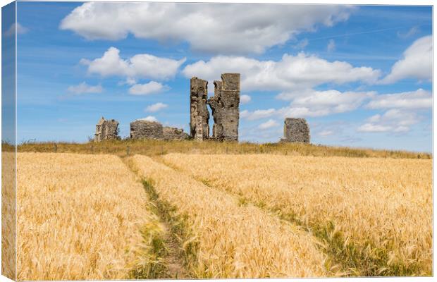 Tractor wheel marks lead to the ruined church of St James Canvas Print by Jason Wells
