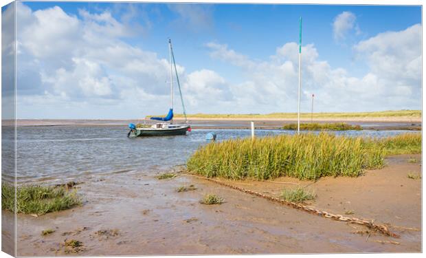 Yacht moored in the River Alt estuary Canvas Print by Jason Wells