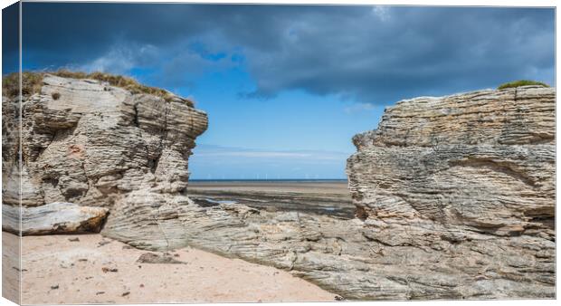 Rock window formation at Hilbre Island Canvas Print by Jason Wells