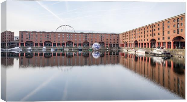 Albert Dock framing the Floating Earth Canvas Print by Jason Wells