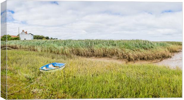 Lone boat at Brancaster Staithe Canvas Print by Jason Wells
