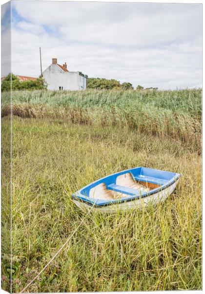 Boat tied at Brancaster Staithe Canvas Print by Jason Wells