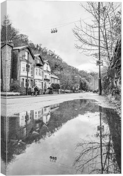 Cable cars reflecting in a puddle Canvas Print by Jason Wells