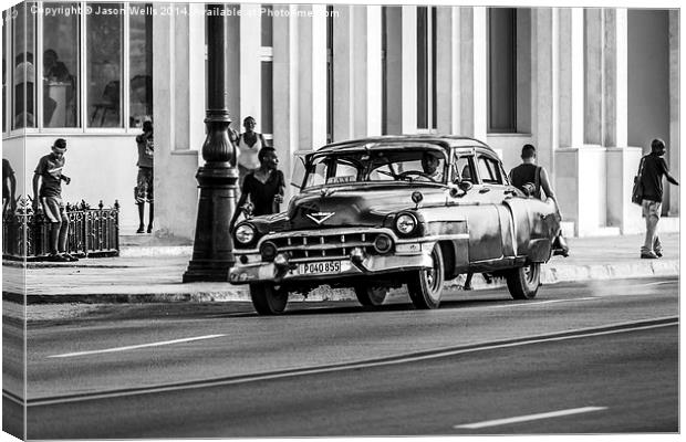  Classical car shugs along the Malecon Canvas Print by Jason Wells