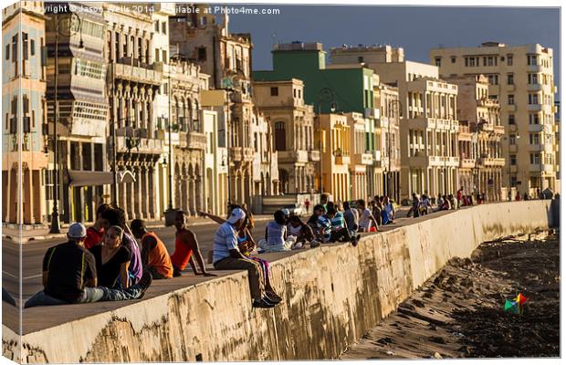 Locals gather on the seawall of Havana Canvas Print by Jason Wells