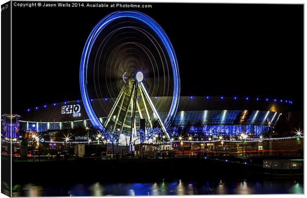  Ferris wheel in front of the Echo Arena Canvas Print by Jason Wells