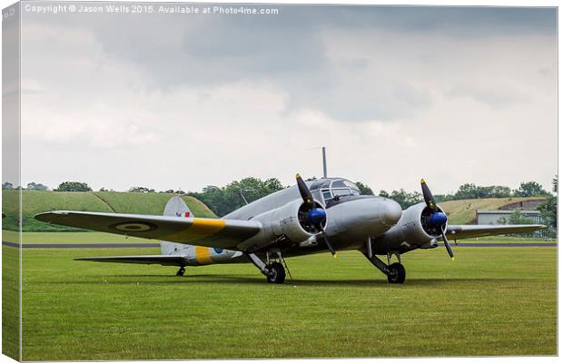 Avro Anson parked on the grass Canvas Print by Jason Wells