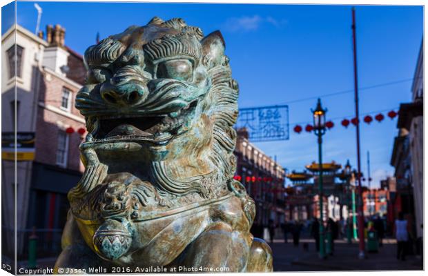 Lion statue at Liverpool's Chinatown Canvas Print by Jason Wells
