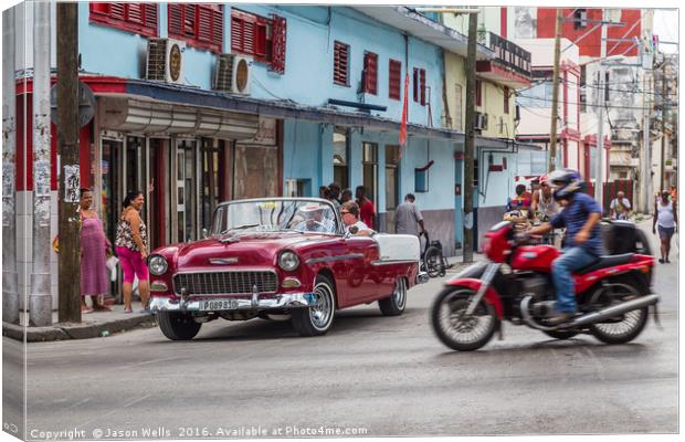 Tourists travel through Havana Canvas Print by Jason Wells