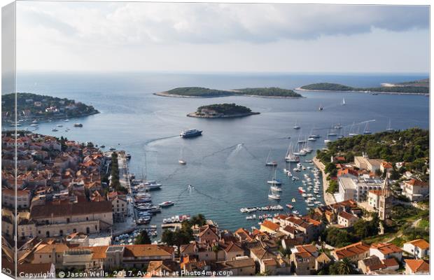 Yacht-dotted inlet of Hvar old town Canvas Print by Jason Wells