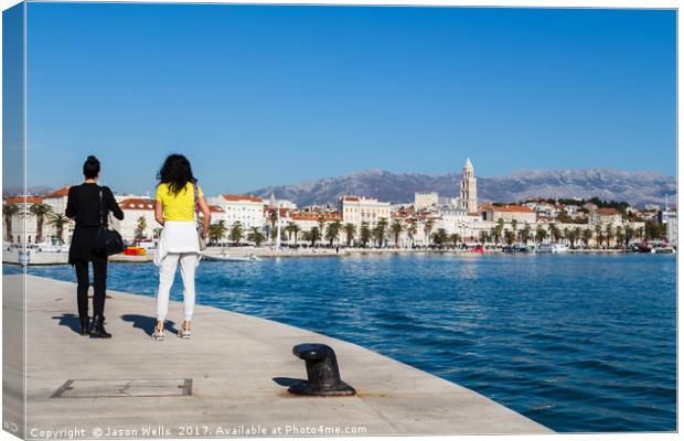 Walking along Split's waterfront Canvas Print by Jason Wells