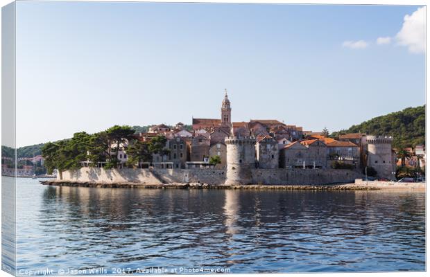 Korcula old town juts out into the Peljesac Channe Canvas Print by Jason Wells