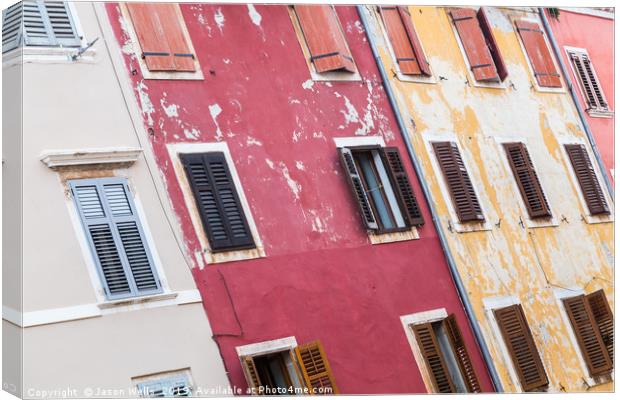 Pastel-coloured houses in Rovinj. Canvas Print by Jason Wells