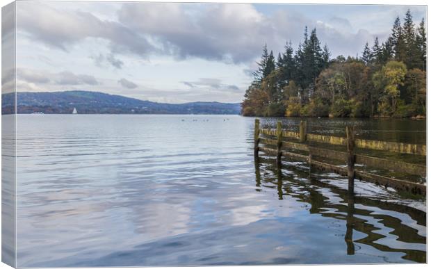 Reflection of a wooden fence Canvas Print by Jason Wells