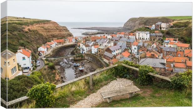 Bench looking down on Staithes Canvas Print by Jason Wells