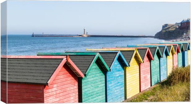 Fading beach huts at Whitby Canvas Print by Jason Wells