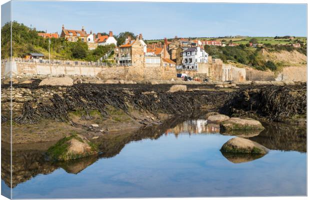 Rockpools in front of Robin Hoods Bay Canvas Print by Jason Wells
