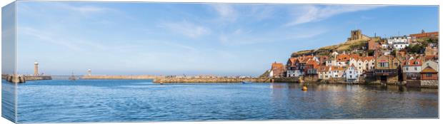 Whitby harbour entrance and East cliff Canvas Print by Jason Wells