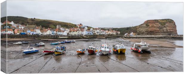 Fishing boats in Staithes harbour Canvas Print by Jason Wells