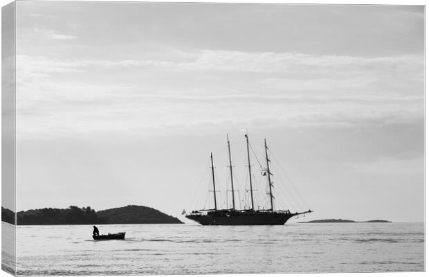 Silhouette of contrasting boats on the Peljesac Ch Canvas Print by Jason Wells