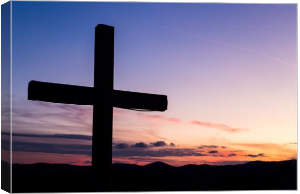 Silhouette of a large cross Canvas Print by Jason Wells