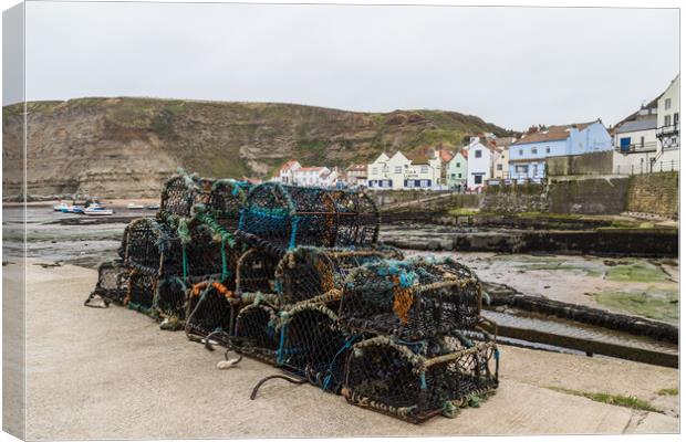 Crab and lobster pots in Staithes Canvas Print by Jason Wells