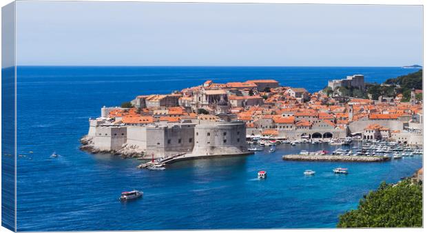 Boats moving around Dubrovnik harbour Canvas Print by Jason Wells