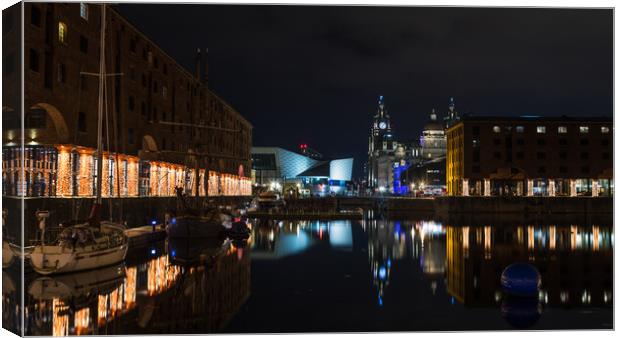 Three Graces and the festive lights reflect in the Albert Dock Canvas Print by Jason Wells