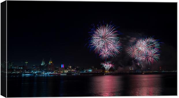 Colourful fireworks above the Liverpool skyline Canvas Print by Jason Wells