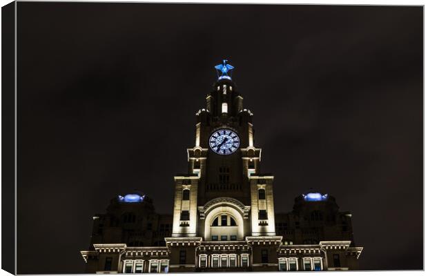Looking up at the Liver Building at night Canvas Print by Jason Wells