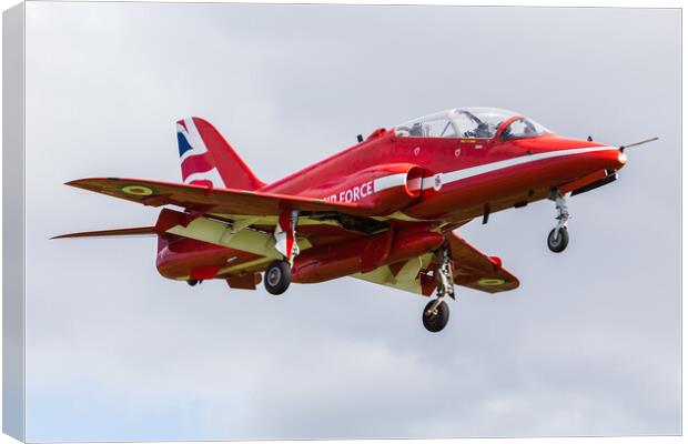 Red Arrow descends into Liverpool airport Canvas Print by Jason Wells