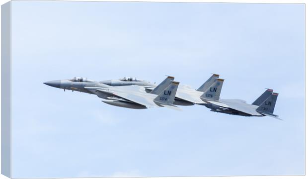 Two F-15C Eagles with an F-15E Strike Eagle Canvas Print by Jason Wells