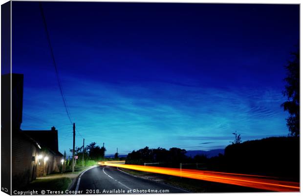 Noctilucent clouds glow above the cars  Canvas Print by Teresa Cooper