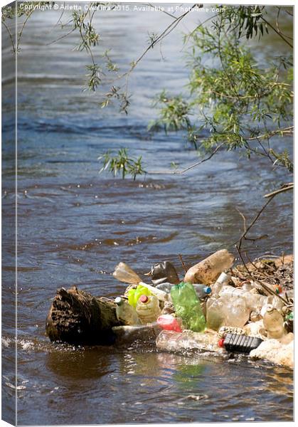 garbage plastic bottles damage river after flood  Canvas Print by Arletta Cwalina