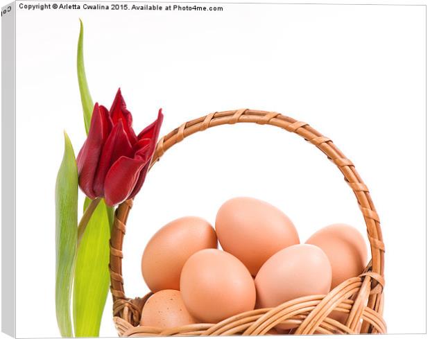 Wielkanocna Swieconka of eggs in wicker basket  Canvas Print by Arletta Cwalina