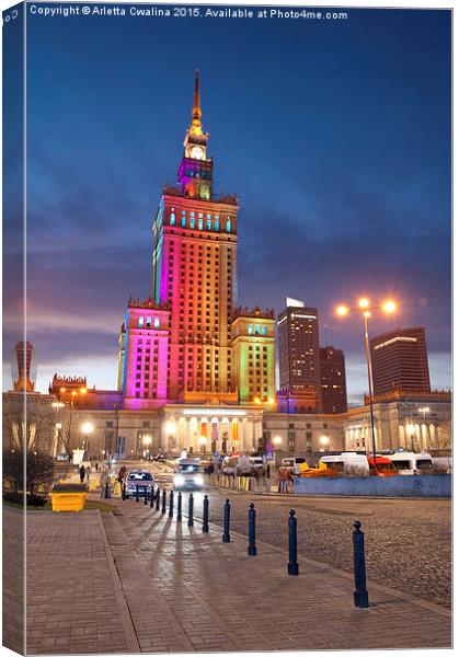 Rainbow colors on PKiN building in Warsaw, Poland Canvas Print by Arletta Cwalina