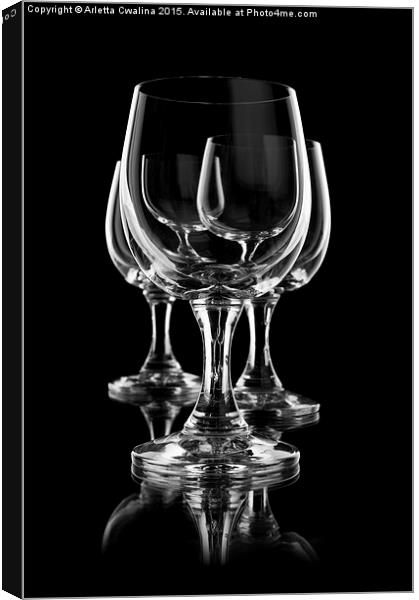 Three empty wine glasses on black Canvas Print by Arletta Cwalina