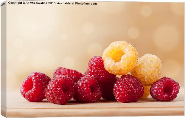 ripe red and golden raspberry fruits Canvas Print by Arletta Cwalina