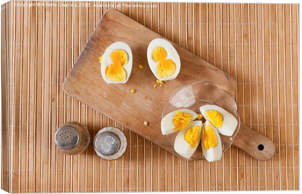 Cut boiled two yolks egg Canvas Print by Arletta Cwalina