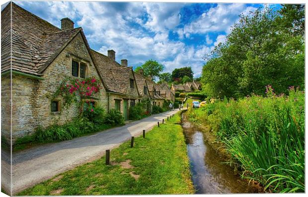  Cotswold stone cottages, Rack isle Bibury Canvas Print by Dean Merry