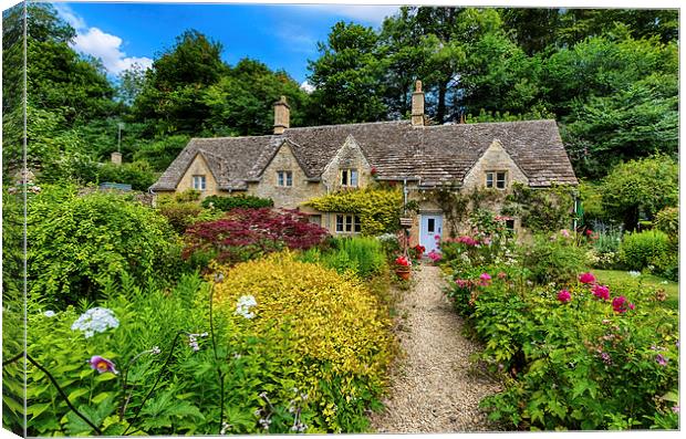 Colourful Cotswold Stone Cottage Canvas Print by Dean Merry