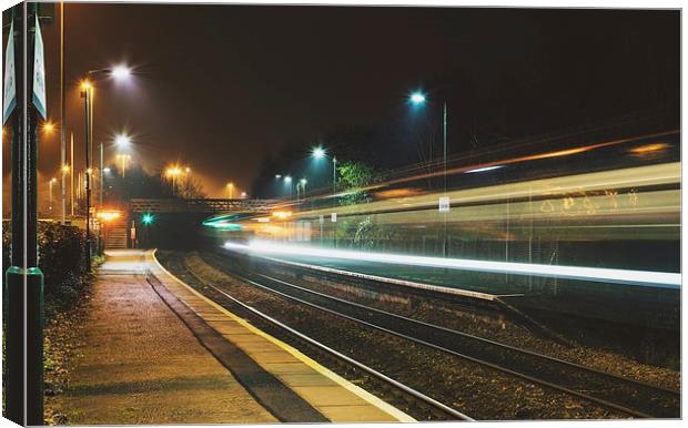 Passing train Canvas Print by Dean Merry