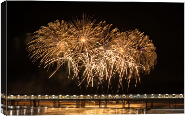 Grand Pier fireworks display Canvas Print by Dean Merry