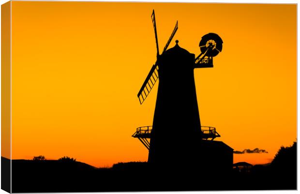 Llancayo windmill silhouette  Canvas Print by Dean Merry