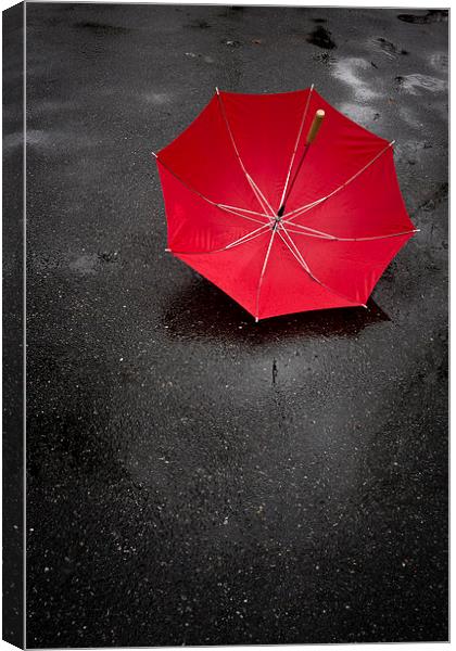 Red umbrella in the rain Canvas Print by Edward Fielding