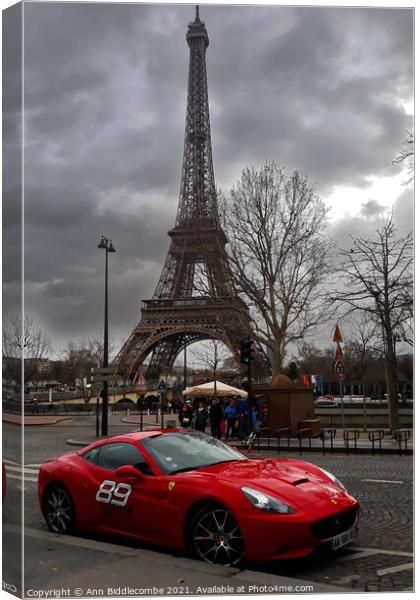 Red Ferrari in front of the Eiffel Tower Canvas Print by Ann Biddlecombe