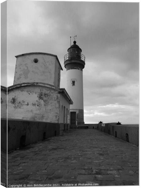 Lighthouse of Le Treport under stormy skys in mono Canvas Print by Ann Biddlecombe